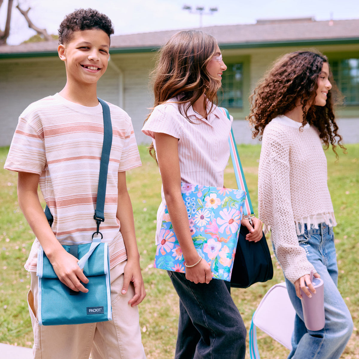 freezable-houston-lunch-bag-x2 freezable-houston-lunch-bag-agave-lifestyle-walking-to-school.jpg